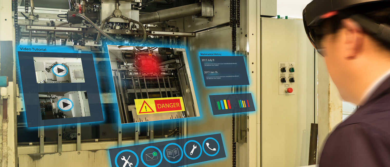 Gefahrenmeldung an einer Maschine.